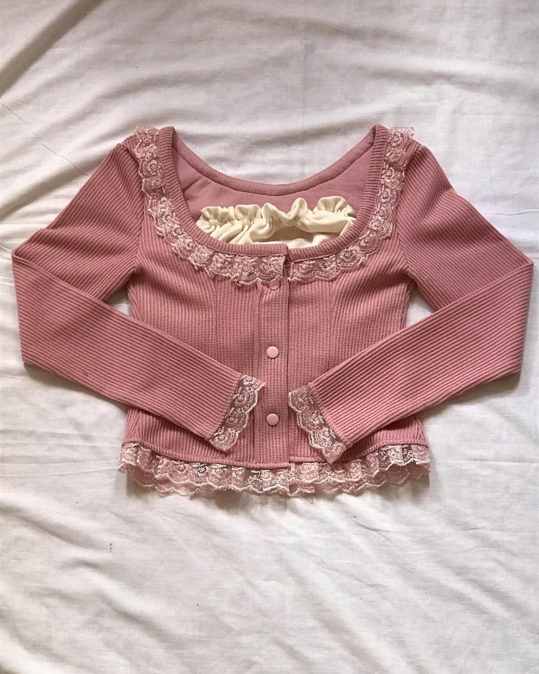 Pull rose coquette